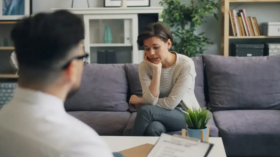 Therapist talking with a client during an individual therapy session